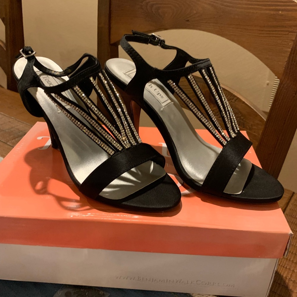 Black formal dress shoes.  Size 7. Worn but good condition.